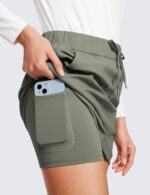 CRZ YOGA 4-Way Stretch Skirts for Women High Waisted Work Casual Golf Tennis Skirt Skorts with 5 Pockets - Image 4